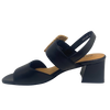 Black leather sandal with a 6cm block heel offering good support and foot coverage. The feature is a large raffia covered buckle on the strap across the instep.