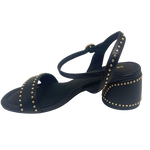 A great little black sandal for every occasion. Although the heel is a block heel its interesting round shape (6.5cm) and stud detail mean it remains elegant yet could easily we worn with your favourite jeans. The gold studded theme continue in the strap across the foot and the bucked Y back. The footbed is comfortably padded.