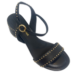A great little black sandal for every occasion. Although the heel is a block heel its interesting round shape (6.5cm) and stud detail mean it remains elegant yet could easily we worn with your favourite jeans. The gold studded theme continue in the strap across the foot and the bucked Y back. The footbed is comfortably padded.