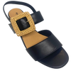 Black leather sandal with a 6cm block heel offering good support and foot coverage. The feature is a large raffia covered buckle on the strap across the instep.