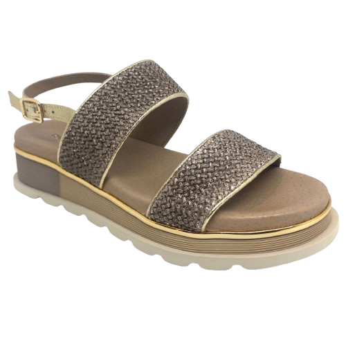 A low summer wedge by Django &amp; Juliette in mocha raffia with a gold trim. It features two bands across the foot and a gold leather back strap. A neutral but interesting and comfortable summer sandal.