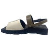 A quirky Japanese inspired sandal in soft patent leathers of off white and khaki. The soft rubber sole has a unique "squared off" appearance. A comfortable and versatile choice for those wanting something a little different.