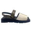 A quirky Japanese inspired sandal in soft patent leathers of off white and khaki. The soft rubber sole has a unique "squared off" appearance. A comfortable and versatile choice for those wanting something a little different.