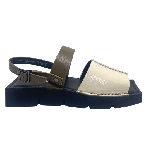 A quirky Japanese inspired sandal in soft patent leathers of off white and khaki. The soft rubber sole has a unique "squared off" appearance. A comfortable and versatile choice for those wanting something a little different.
