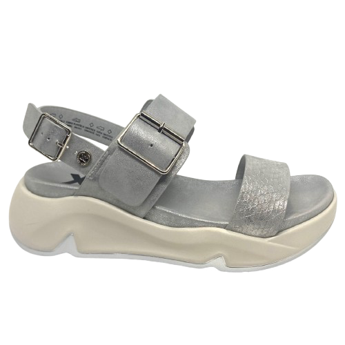 Super comfy and stylish, you'll have this sandal on high repeat all summer. Made with man made materials, it has a super comfy footbed with arch support and is adjustable across the instep and around the heel. The soft metallic finish has a skin pattern on the front strap and metallic detail on the wedge which both add to the look.