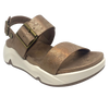 Super comfy and stylish, you'll have this sandal on high repeat all summer. Made with man made materials, it has a super comfy footbed with arch support and is adjustable across the instep and around the heel. The soft metallic finish has a skin pattern on the front strap and metallic detail on the wedge which both add to the look.