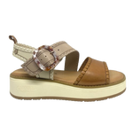 This comfortable little pair or flatform sandals in an interesting and versatile colour way of three tones of camel/beige/cream feature a "horn" look buckle and blanket stitched edges on the straps.