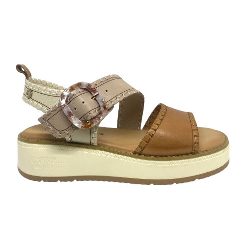 This comfortable little pair or flatform sandals in an interesting and versatile colour way of three tones of camel/beige/cream feature a "horn" look buckle and blanket stitched edges on the straps.