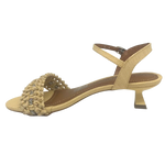 This pretty little sandal is made in a butter coloured "crocheted" raffia which has a comfortable width strap across the toes that features a tiny row of diamontes woven across it. The Y back provides good support and the 5cm kitten heel offers a dressed look while being a comfortable height. Made in Brazil.