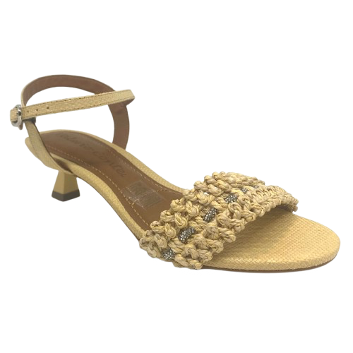 This pretty little sandal is made in a butter coloured "crocheted" raffia which has a comfortable width strap across the toes that features a tiny row of diamontes woven across it. The Y back provides good support and the 5cm kitten heel offers a dressed look while being a comfortable height. Made in Brazil.