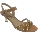Tan isn't always a colour that looks "dressed" but here we have it in a patent leather trimmed with gold studs and a beautifully shaped 7cm gold heel. The crisscrossed straps across the toes offer good foot coverage and the Y back offers support. Made in Brazil.