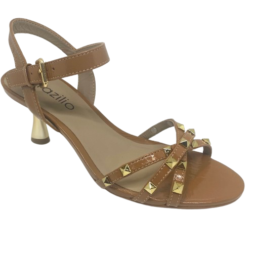Tan isn't always a colour that looks "dressed" but here we have it in a patent leather trimmed with gold studs and a beautifully shaped 7cm gold heel. The crisscrossed straps across the toes offer good foot coverage and the Y back offers support. Made in Brazil.