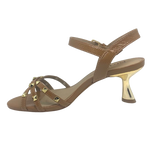 Tan isn't always a colour that looks "dressed" but here we have it in a patent leather trimmed with gold studs and a beautifully shaped 7cm gold heel. The crisscrossed straps across the toes offer good foot coverage and the Y back offers support. Made in Brazil.