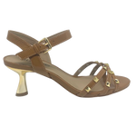 Tan isn't always a colour that looks "dressed" but here we have it in a patent leather trimmed with gold studs and a beautifully shaped 7cm gold heel. The crisscrossed straps across the toes offer good foot coverage and the Y back offers support. Made in Brazil.