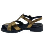 With a nod to the fisherman sandal this quirky little beauty is perfect in bronze leather with a comfortably soft flat sole piped in black patent leather. Designed by Alfie &amp; Evie.