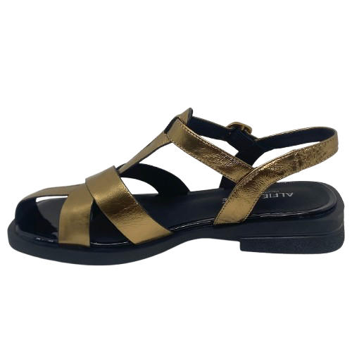 With a nod to the fisherman sandal this quirky little beauty is perfect in bronze leather with a comfortably soft flat sole piped in black patent leather. Designed by Alfie &amp; Evie.