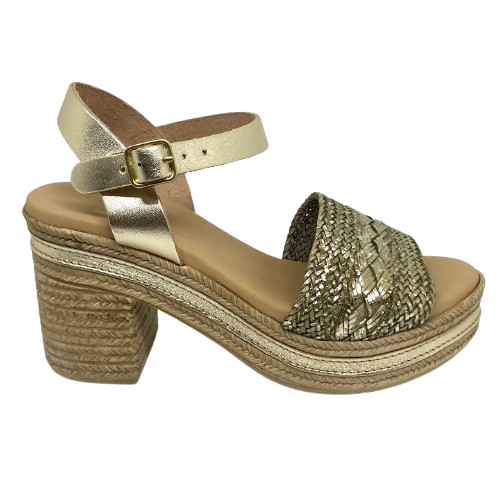 With it's retro flavour, light weight poly platform sole and metallic finish these little sandals could be you ultimate party shoe! Made in Spain.