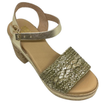 With it's retro flavour, light weight poly platform sole and metallic finish these little sandals could be you ultimate party shoe! Made in Spain.
