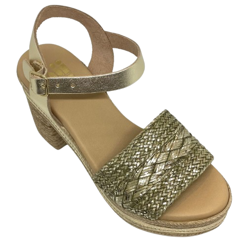 With it's retro flavour, light weight poly platform sole and metallic finish these little sandals could be you ultimate party shoe! Made in Spain.