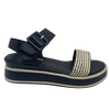 This low flatform wedge in black has a weave of both black and white in the front strap making it a versatile and interesting little sandal. A wide Y back gives plenty of support and is finished with a leather covered buckle. Made by Cassini.