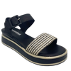 This low flatform wedge in black has a weave of both black and white in the front strap making it a versatile and interesting little sandal. A wide Y back gives plenty of support and is finished with a leather covered buckle. Made by Cassini.