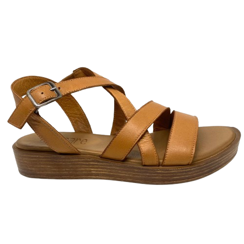 An everyday little tan sandal that will soon become a favourite go to. Made on a low wedge with a cushioned sole by Rilasarre.