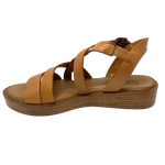 An everyday little tan sandal that will soon become a favourite go to. Made on a low wedge with a cushioned sole by Rilasarre.