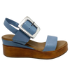 Blue denim leather and a striking leather covered buckle in silver make this little wedge stand out from the crowd. The base of the wedge has a dark tan stacked leather effect. Brand is Rilassare.