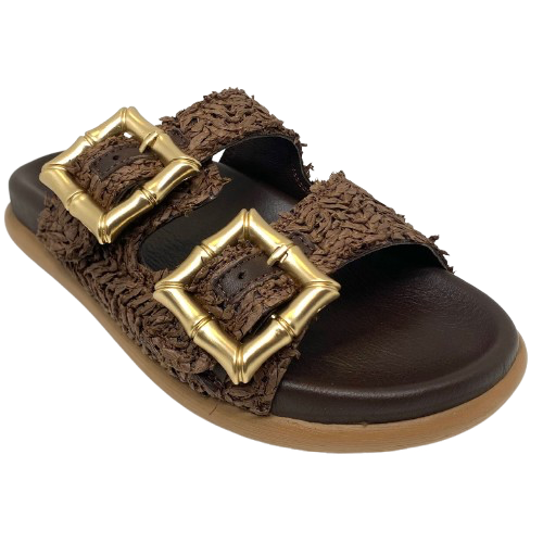 With a spongy, moulded leather sole, raffia covered leather upper and two brushed gold bamboo buckles these little slides will be a go to in any summer wardrobe. Made by Sempre Di.