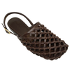 This quirky little flattie could be described as a "mule with a back strap". It has an asymmetrical shaped toe which is covered by knotted, open weave, chocolate coloured leather. Brand is Mollini.