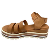 Flatforms are a great way to gain height without having to have heels. These tan sandal flatforms have and interesting combination of neutral coloured layers in the sole giving a striped effect. The upper straps are soft and offer good coverage and a buckled strap across the instep.