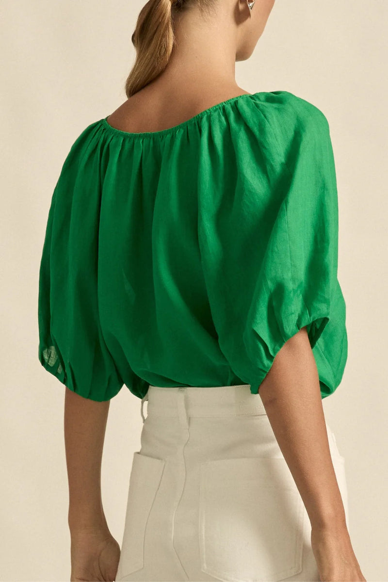 designed to move through warm days with comfort and confidence.
• made in 100% ramie
• raglan sleeve with relaxed cuff for casual ease
• wide v-neckline balances shape
• off-the-body fit for effortless comfort
• ideal for summer styling and layering