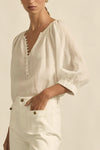 easy yet considered, the tranquil top is a relaxed staple designed for daily wear.

100% ramie
gathered neckline with delicate shell buttons
off-the-body fit offers versatility and ease
raglan sleeve with elastic cuff for styling flexibility
ideal for casual layering and warm weather