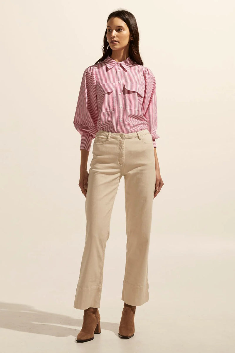 The Underpin is a feminine and spirited take on the classic button-through shirt, a gathered shoulder and cuff create a blouson sleeve that provides a flourish and contrast to the traditional shirting elements.    Colour: Magenta Stripe