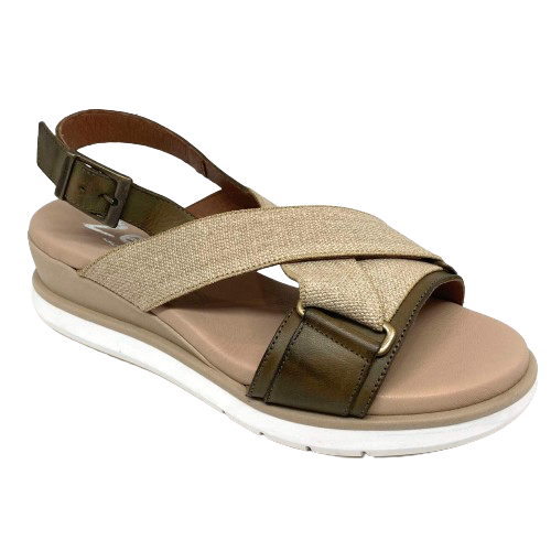 Made in Spain by Zeta this wedge will be a favourite all summer long. The leather upper has great foot coverage with cross over straps in natural canvas material with a subtle gold thread. Leather lining ensures they feel as good as they look. Weft in Khaki/Natural