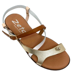 This little thong/sandal has a low wedge, super soft cushioning in the footbed, light weight, and comes in the great summer combo of white, tan, nude and gold. It's the perfect go-to for your summer wardrobe. Made in Spain.