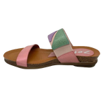 This pretty pastel multi slide has a contoured footbed and suede lining. The strap across the instep is elasticized with patches of leather for comfort on the highest of arches. The cushioned sole means this little slide is bound to become a summer favourite. Made in Spain.