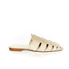A soft leather snake printed leather flat mule. Colour nude.