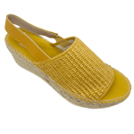 920 × 1920px  Wedged Spanish espadrille with woven elasticated rafie upper and rope wedge. Sling back offers support. Colour mustard.