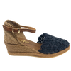 This classic Spanish espadrille has a wonderful jute woven fabric in it's covered toe. The back is hessian and the ankle strap is a tan leather. Wedge height is 4 tier (5cm). The colour is marino (navy).