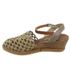A Spanish espadrille in a two toned natural (slightly khaki) jute with a closed toe, a tan leather Y back and strap and a four tier (5cm) wedge.