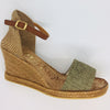 Summer wedge espadrille. Five tier high. 6cm with 1cm platform. Comfortable. Dressed up or down. Worn with pants, shorts, skirts or dresses. Tan leather ankle strap. Hessian heel cup. Jute front. Khaki.