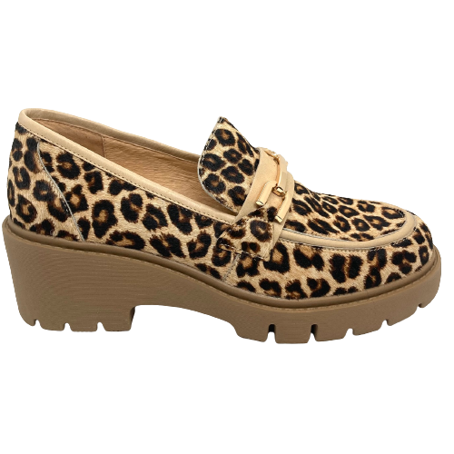 Pony print leopard, a tab across the front of the foot with a gold gauci trim and a heavy gum sole make these loafers both comfortable and very "now".  By Top End.