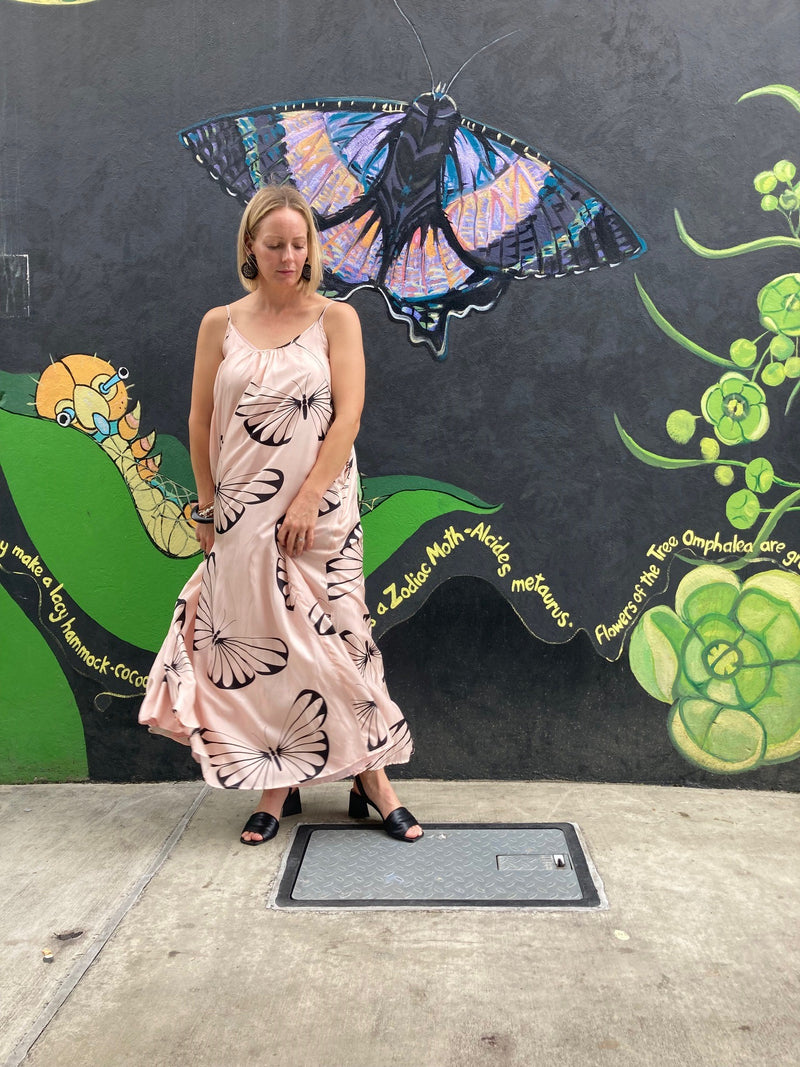 Soft and floaty, the butterflies dress is a dream to wear.  Made of silk with adjustable straps, softly gathered front and back with a cotton slip. This dress can be worn with heels or change the vibe with your favourite flat slides.   M.A. Dainty  Blush Pink