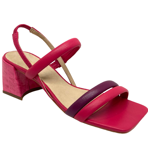 This little Brazilian made sandal in a colourful mix of fuchsia and purple mid has padded straps for extra comfort, a square toe and an interestingly shaped block heel of 7cm in height.