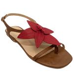 These fun, flat summer sandal/thongs are as light as a feather, have a soft flexible sole and look great with just about anything! Available in two great colour ways tan with cream flower and tan with a dull red coloured flower. Made in Brazil.