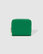 The Louenhide Bridget Wallet is a stylish and timeless classic, designed in a compact size. Constructed in smooth vegan leather, this compact everyday style has room for your essentials with multiple card slots, note pockets, and a zipped coin pocket. Designed in bright colours, so you’ll never lose the Bridget at the bottom of your bag! The Bridget wallet is the perfect size to fit inside your crossbody bag or larger tote.