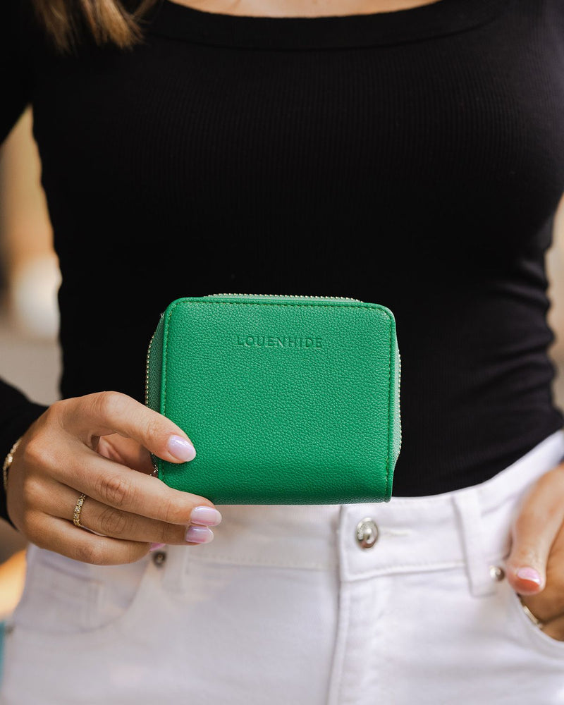 The Louenhide Bridget Wallet is a stylish and timeless classic, designed in a compact size. Constructed in smooth vegan leather, this compact everyday style has room for your essentials with multiple card slots, note pockets, and a zipped coin pocket. Designed in bright colours, so you’ll never lose the Bridget at the bottom of your bag! The Bridget wallet is the perfect size to fit inside your crossbody bag or larger tote.
