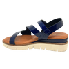 This is an extremely soft soled, comfortable and supportive sandal with a super spongy foot bed. The soft patent leather is available in both mustard and navy. The white sole offsets a patent leather covered wedge. Made in Spain.