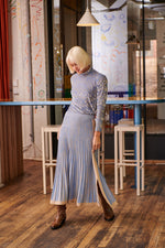 A slightly fitted rolled-neck skivvy made from a lightweight and slightly sheer fabrication that's perfect for you to layer over. Finished with velour burnouts that create a patterned effect in a soft colour combination, this versatile piece can be equally dressed up for occasion.  Shown here with: The Knitted Davy Skirt  Composition: Polyester